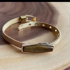 Brown and gold metal tiger eye bracelet.  Watch band like band.